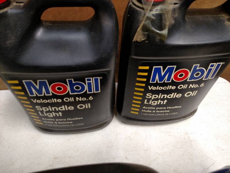 lot 188 image: (4) Mobil 1 Gallon Light Spindle Oi...