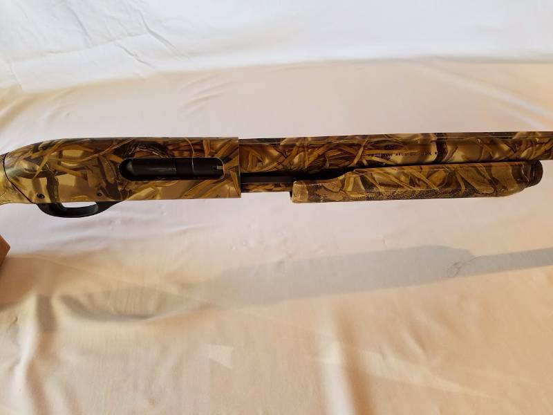 lot 4 image: Remington 870 Express Super Magnum 12 Gauge (2 34..3..3 12 ) Camoflagued