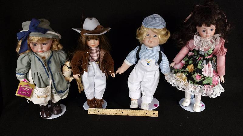 (4) Dolls in Various Garb