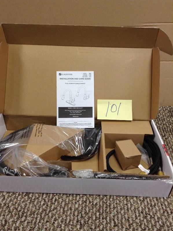 lot 101 image: Glacier Bay Market Single-Handle Pull-Down Sprayer Kitchen Faucet in Bronze never used