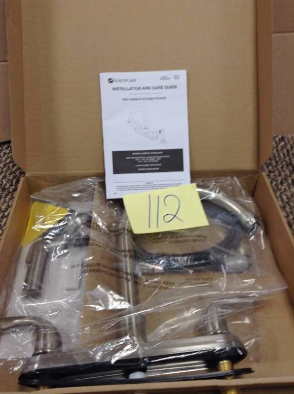 lot 112 image: never used Glacier Bay Builders 2-Handle Standard Kitchen Faucet with Sprayer in Stainless Steel