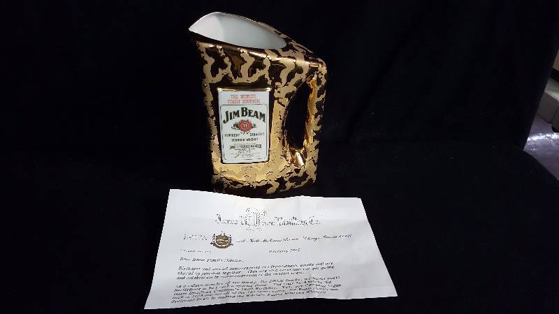 lot 82 image: Jim Beam Whiskey Pitcher