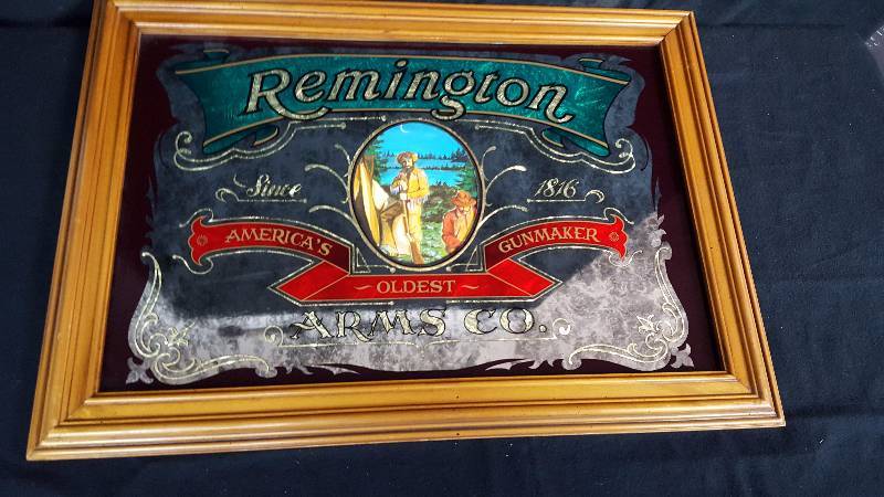 lot 90 image: Remington Arms Mirror