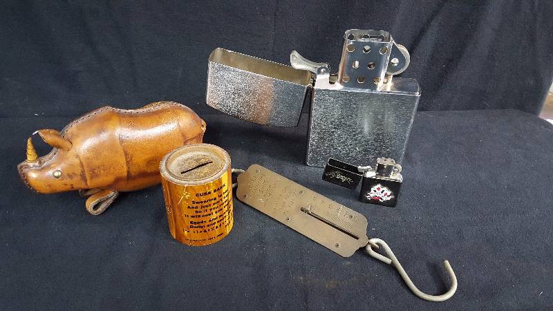 lot 107 image: Coin Banks & Lighters