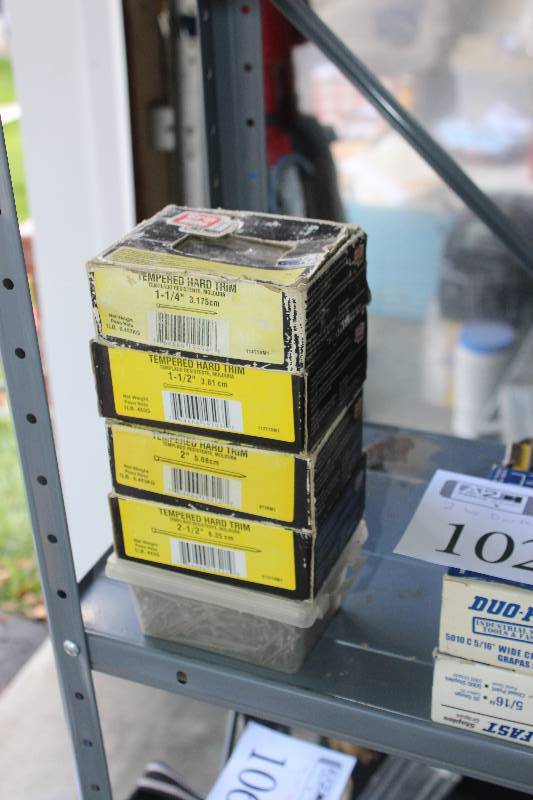lot 101 image: Lot of (4) Boxes of GripRite 1-14in. Tempered Hard Trim Nails