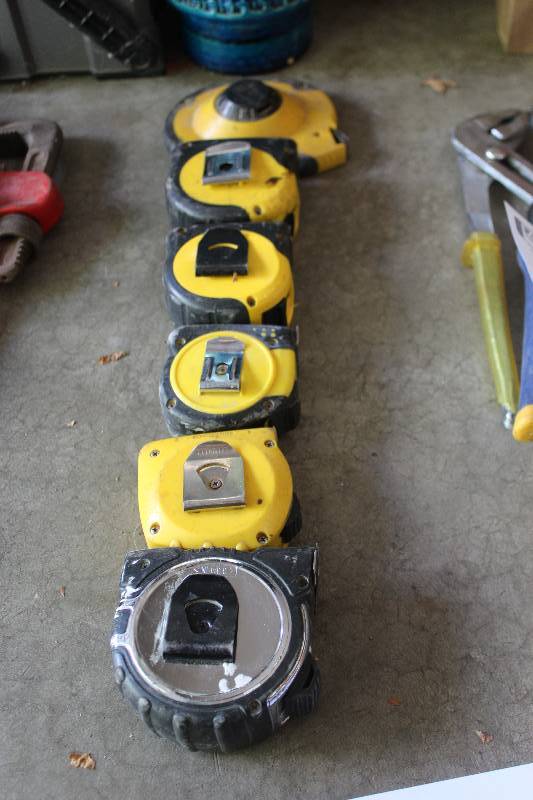 lot 180 image: Lot of (6) Tape Measures Includes 35ft., 25ft. 100ft.