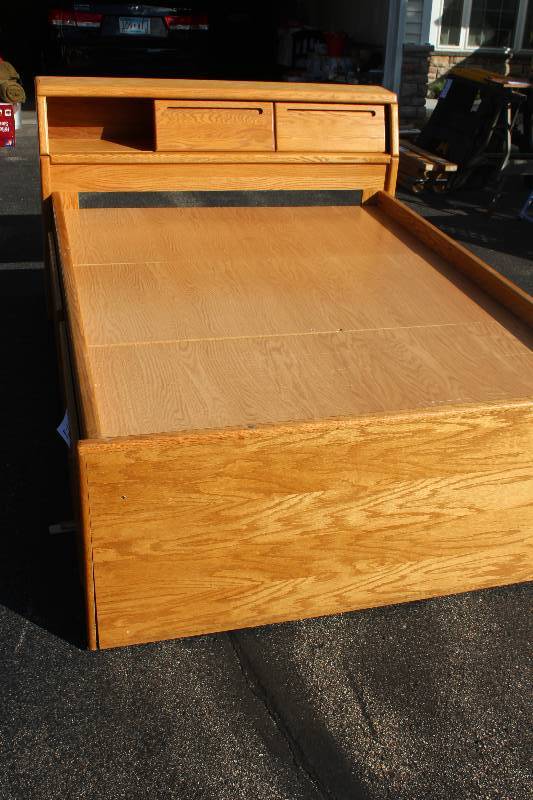 lot 225 image: Queen Wood Bed Frame w 2-Sliding Door Headboard, 4-Door Hideaway