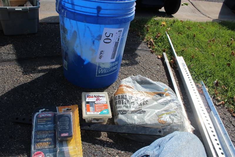 lot 50 image: Garage Door Repair Kit Includes Rubber Seal, Metal Braces, Hinge Assemblies, Emergency Release Bar, And More