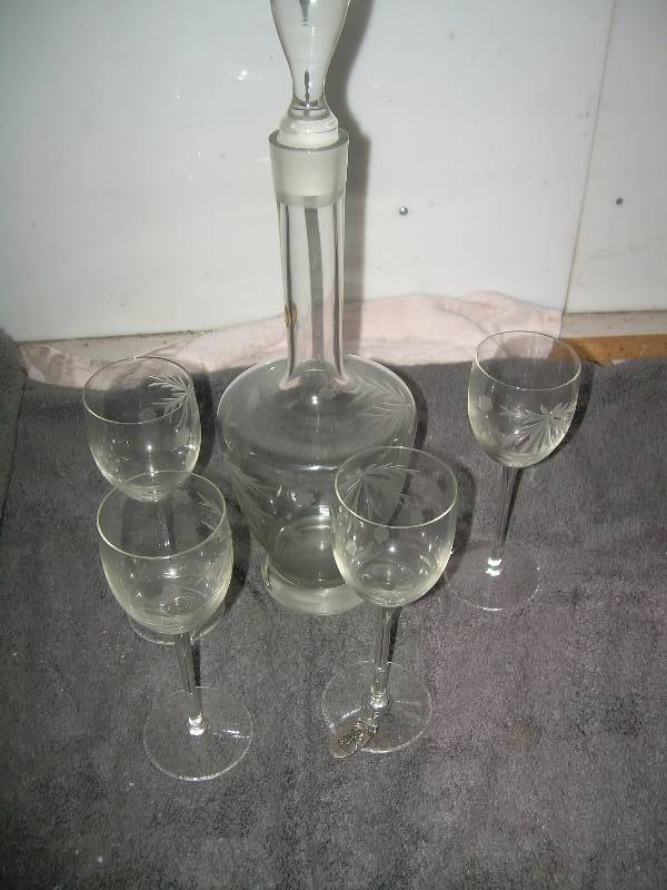lot 29 image: VINTAGE WINE BOTTLE AND GLASSES