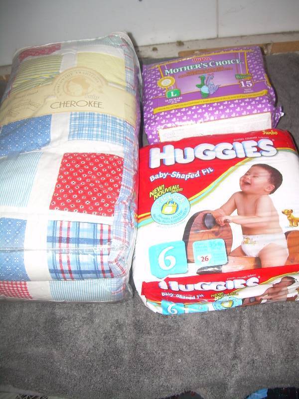 lot 58 image: CRIB BUMPER , NEW DIAPERS