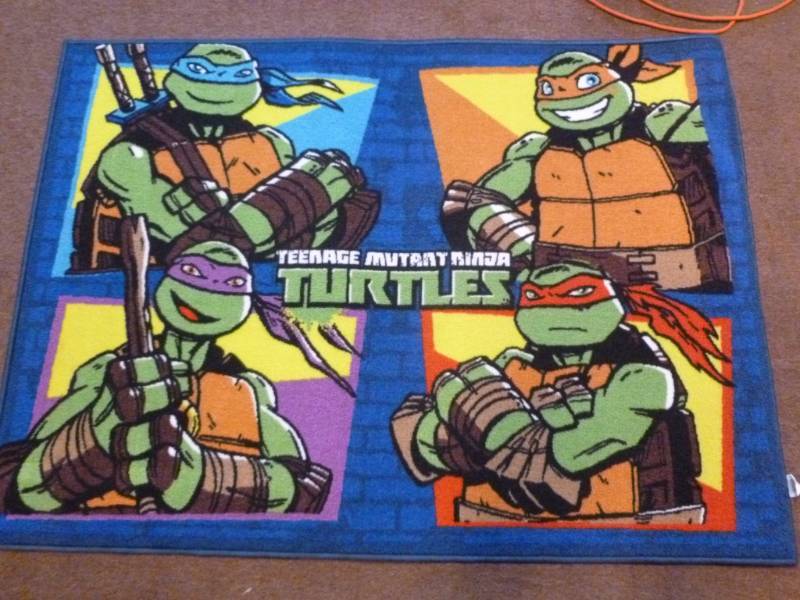 lot 84 image: Teenage Mutant Ninja Turtles Rug
