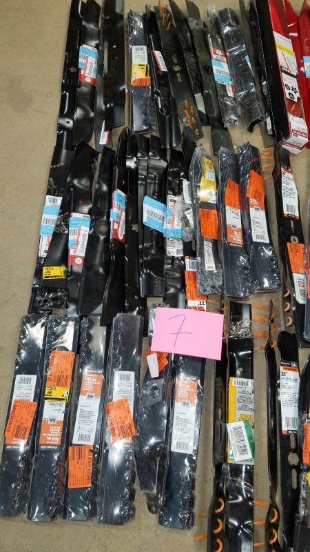 Large lot of new tractor and mower blades, assorted sizes and brands all new