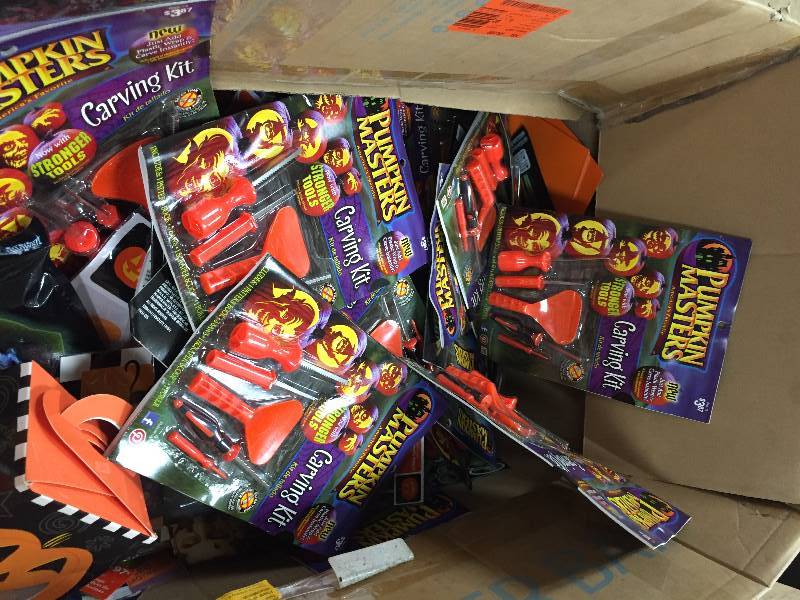 Gaylord with assorted halloween items, customs, decorations, bags, hair spray, treat bags, pumpking carving kits and decorations, and more. Items new and open packages