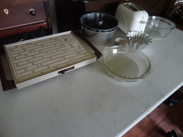lot 107 image: Electric Hot Plate, Bunt Pans, Toaster, Aluminum Molds, Glass Mixing Bowl