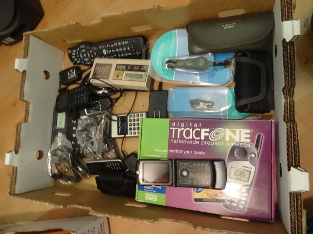 lot 200 image: Misc Trac Phone, Remote Control In Box