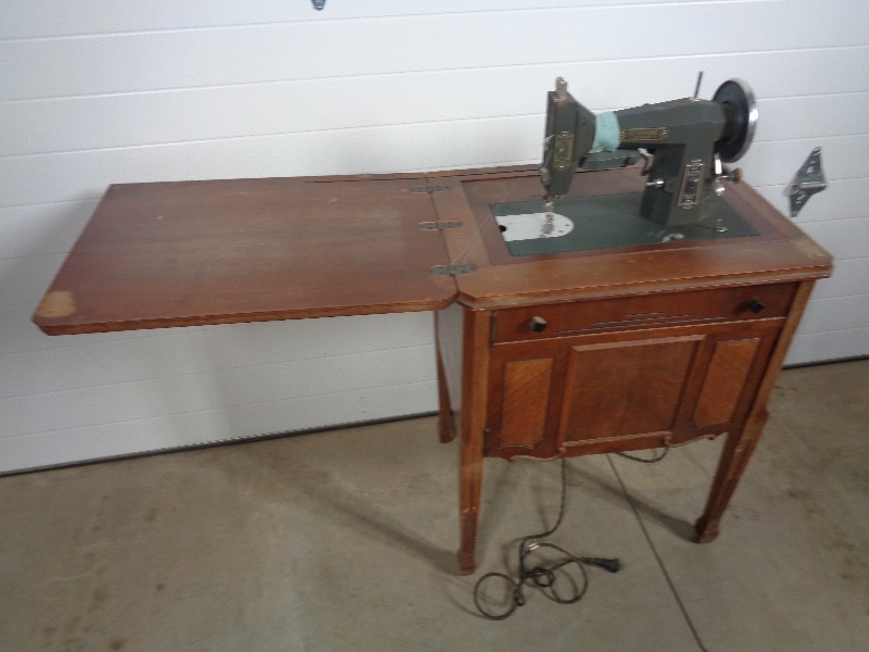 lot 104 image: Vintage Kenmore Sewing Machine and Wood Cabinet