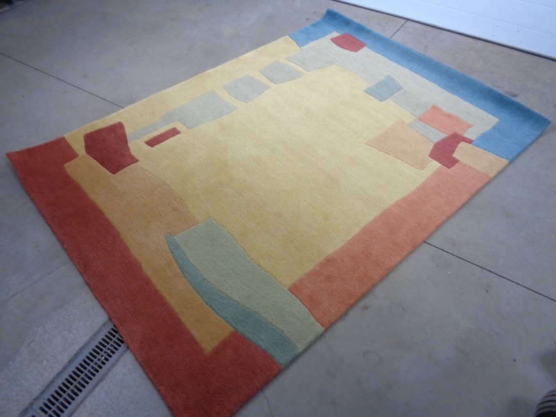lot 111 image: Hand Woven Wool Rug