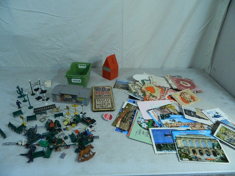 lot 23 image: Vintage Train Toys, Old Postcards, and More