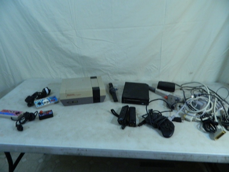 lot 56 image: Gaming Consoles and Accessories