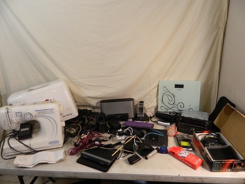 lot 155 image: Euro Pro Sewing Machine and Assorted Electronics
