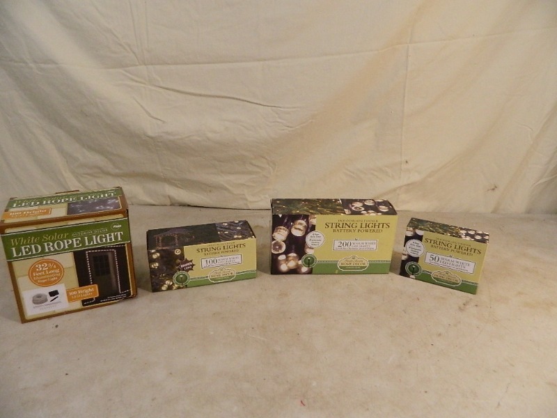lot 158 image: 4 New Boxes of Solar and Battery Operated Lights