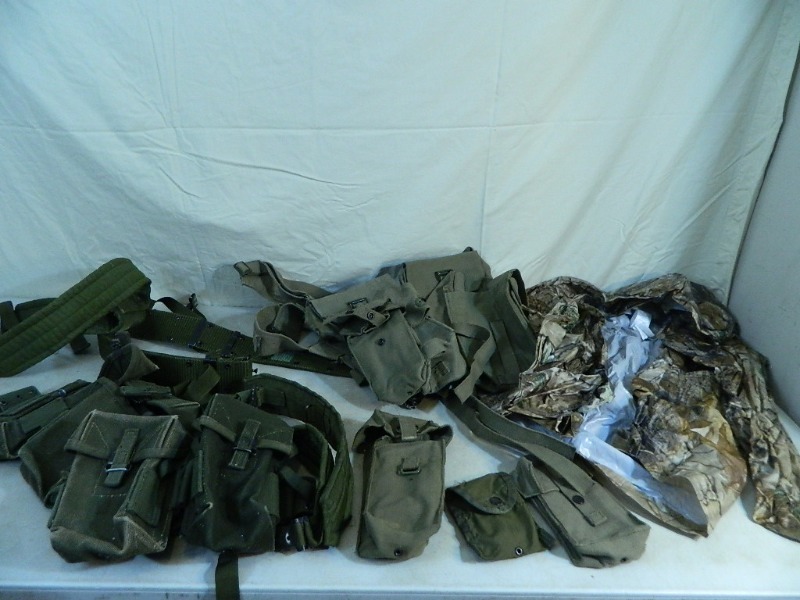 lot 53 image: Coleman Camo Rain Poncho, Army Belts, and More
