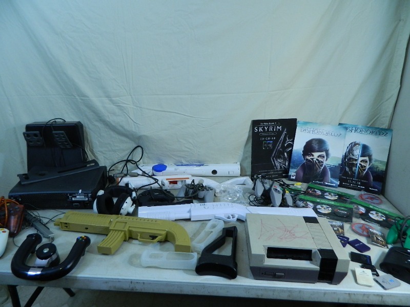 lot 55 image: Gaming Consoles and Accessories