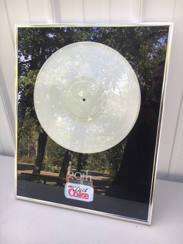 lot 10 image: Platnium Record of Diet Cokes 20th Anniversary