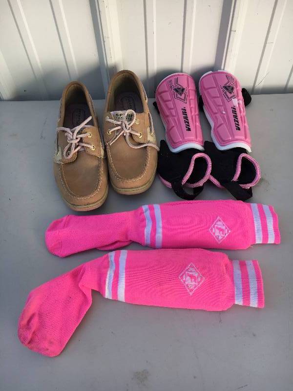 lot 67 image: Soccer ShingaurdsSocks and Size 7.5 Shoes