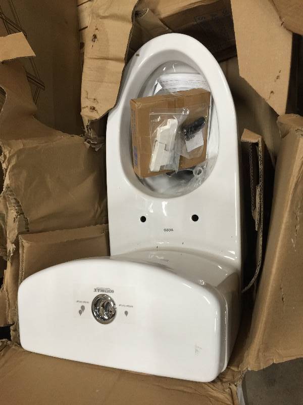 Aquia 1-Piece Elongated 0.91.6 GPF Dual Flush Skirted Toilet in Cotton White