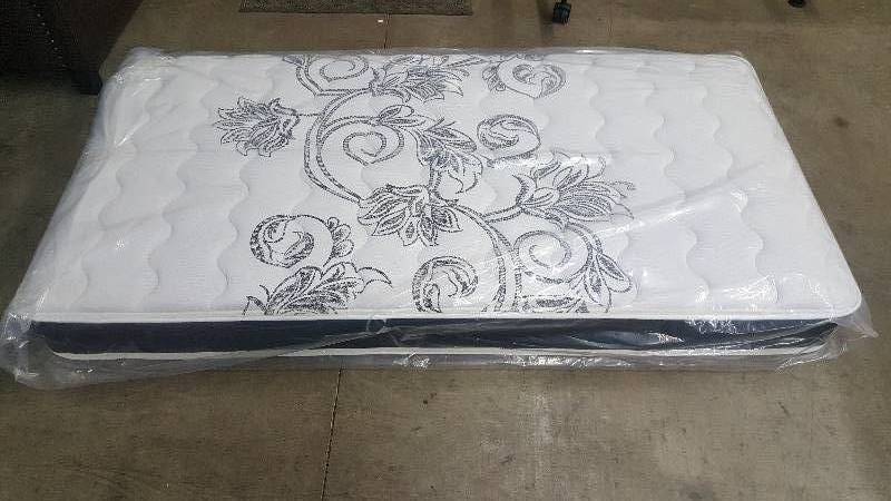 lot 9 image: New Twin Kathy Irland Mattress - Retail $499.99