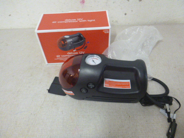 lot 77 image: NEW Air Compressor with Light