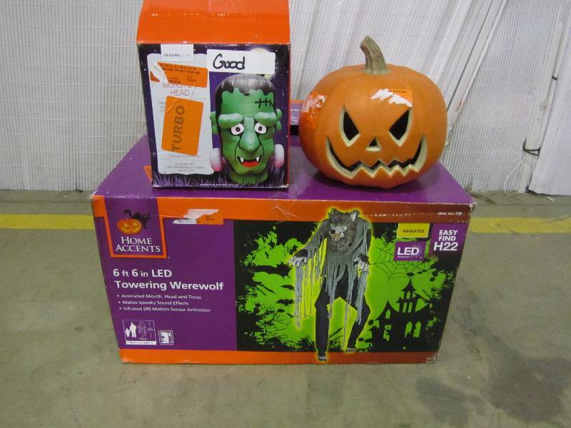 lot 4 image: 7 Towering Werewolf, 36 x 36 x 48inflatable Frankenstein Head, 9 Jack-o-lantern