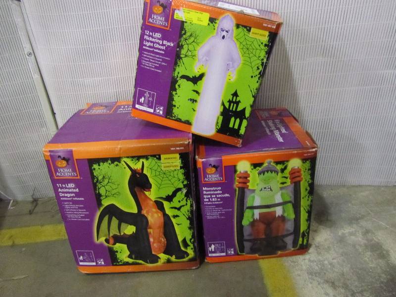 lot 8 image: 12 Giant inflatable ghost, 6 Short Circuit Monster, 9 Inflatable Fire and Ice Dragon