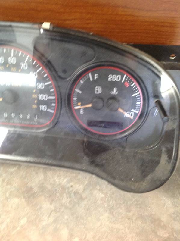 lot 77 image: Dash board instrument panel, and Dodge Avenger Grill