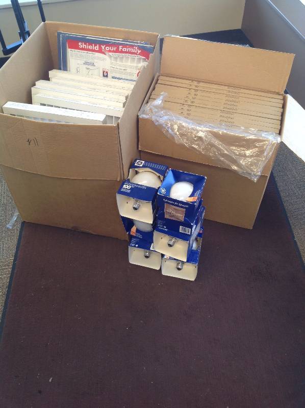 lot 11 image: Two Boxes of Air Filters and Six Light Bulbs