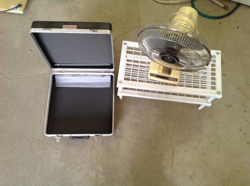 lot 67 image: Fan,Two Plastic Shelves and a Case