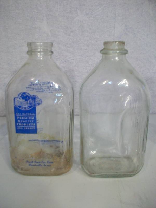 lot 23 image: Glass Milk Bottles