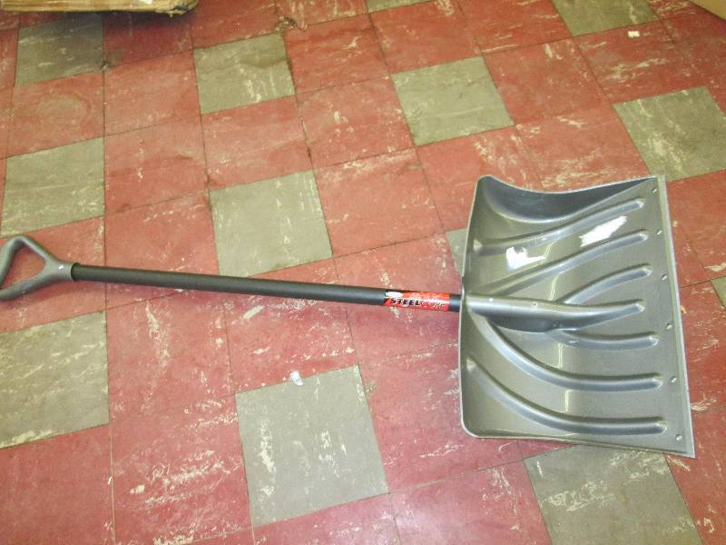 Almost new steel core shovel...