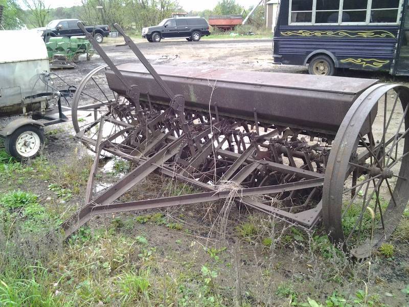 lot 2 image: McCormick Deering Vintage Steel Wheel SeederPlanter