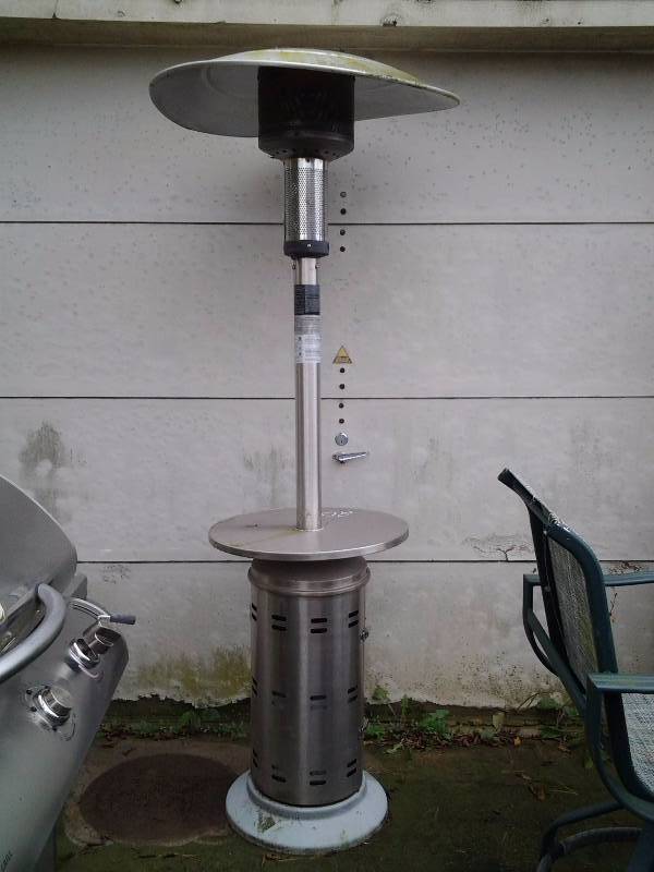 lot 16 image: Stainless 7 Foot Tall Patio Heater With Tank- LG-36C