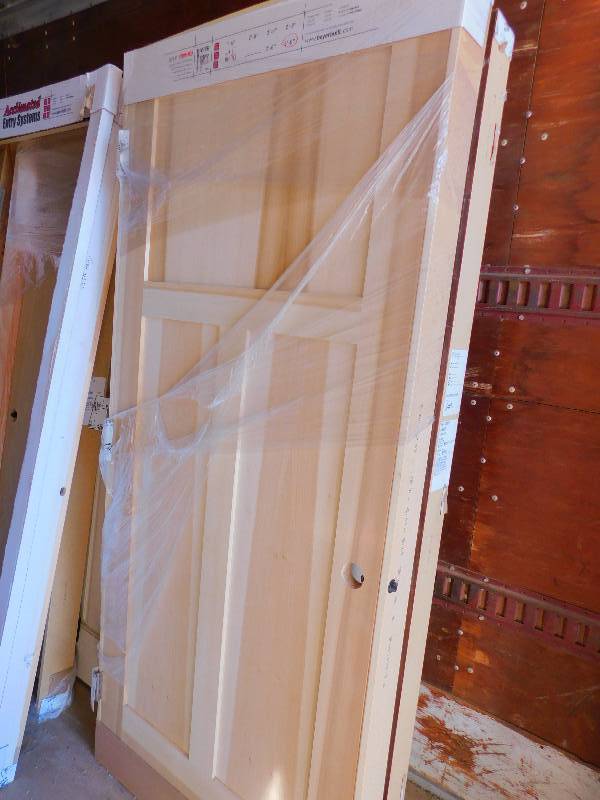 lot 55 image: New Poplar 3-Panel Door with Frame