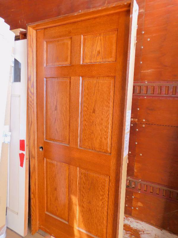 lot 57 image: (2) Solid Oak Raised 6-Panel Doors with Frames
