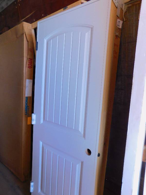 lot 61 image: New Hollow Raised Panel Door with Frame