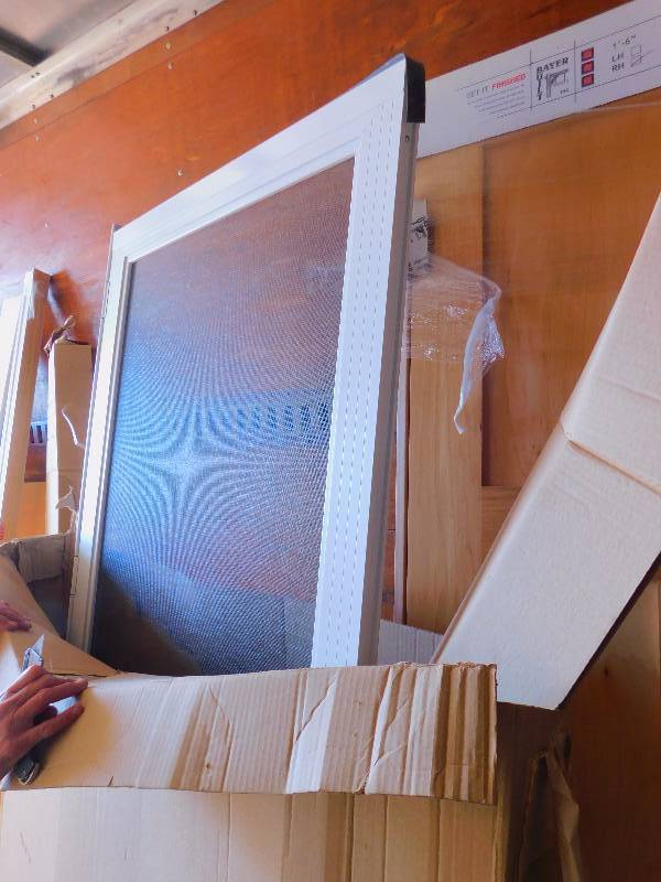 lot 77 image: New Hinged Screen Door with Hardware