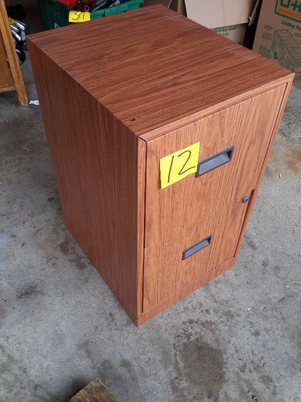 lot 12 image: 2 drawer letter size file cabinet.. Simulated wood METAL