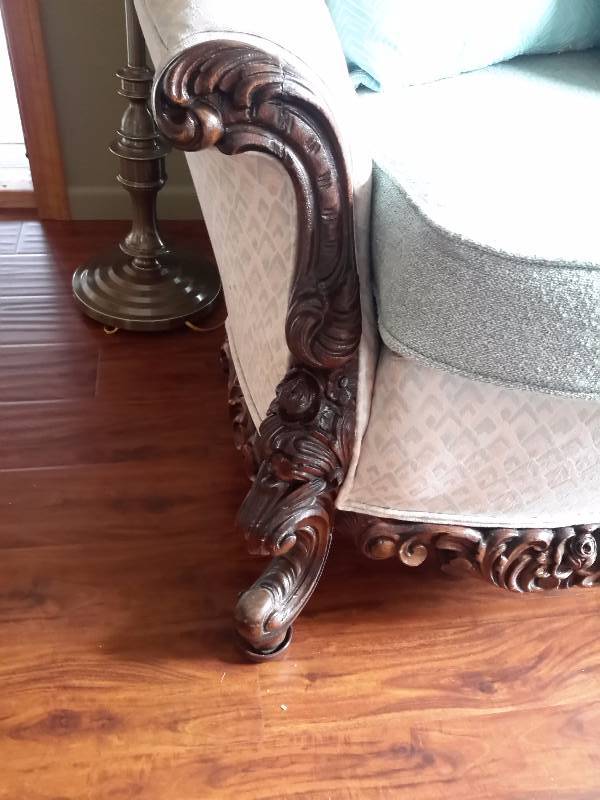 lot 7 image: Heavy, Fan Back type sofa with intricately carved wood trim.. LOTS OF TRIM Two Tone upholstery.. Very good shape