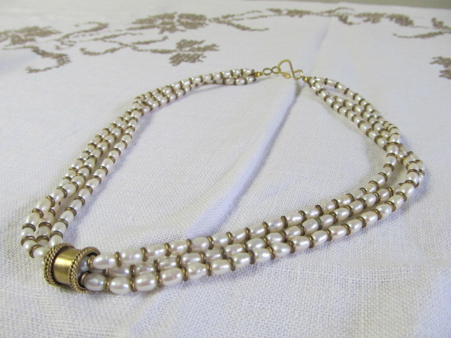 lot 11 image: 16 Triple Strand Freshwater Pearl Necklace