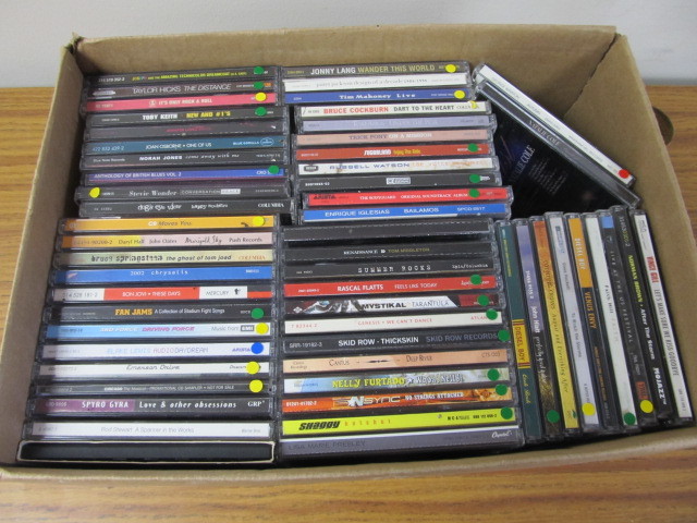 lot 32 image: 50 Mixed Genre CDs - Rock Rap Country etc.