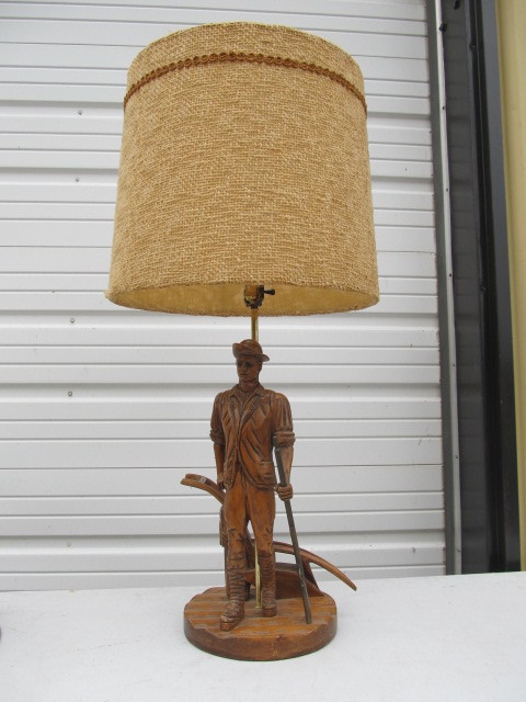 lot 45 image: Large Vintage Frontiersman Carved Wood Table Lamp